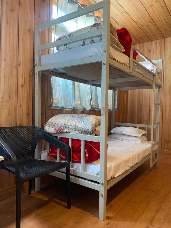 Postel nebo postele na pokoji v ubytování Lenzila Retreat