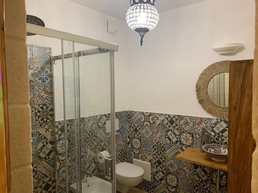 Koupelna v ubytování Trulli Santa Maria Odegitria Relais
