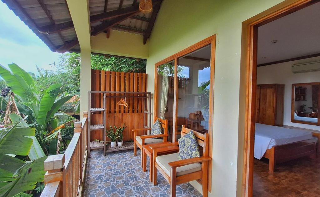 Giường trong phòng chung tại Ancarine Beach Resort