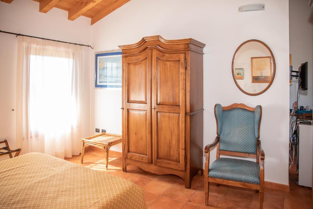 Postel nebo postele na pokoji v ubytování Bio Agriturismo Vojon