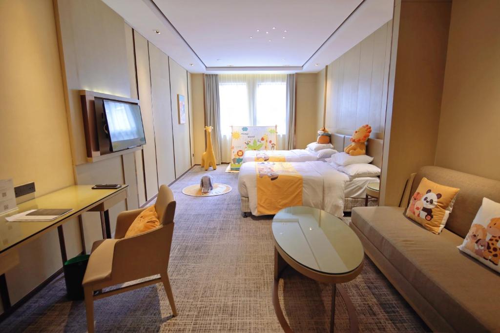 TV a/nebo společenská místnost v ubytování Courtyard by Marriott Shanghai International Tourism and Resorts Zone