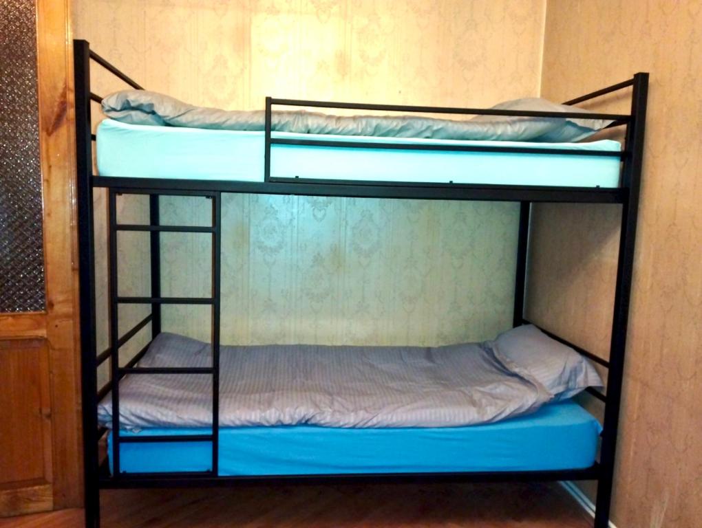 Letto o letti in una camera di Long Tree Hostel - Comfy Mattress