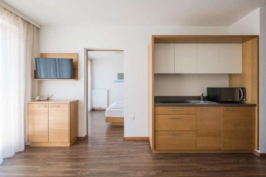 Kuchyň nebo kuchyňský kout v ubytování Residence Aqualis