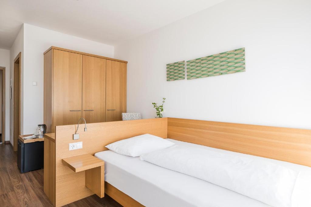 Postel nebo postele na pokoji v ubytování Residence Aqualis