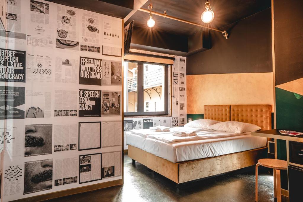 Postel nebo postele na pokoji v ubytování Timeout Heritage Hotel Zagreb