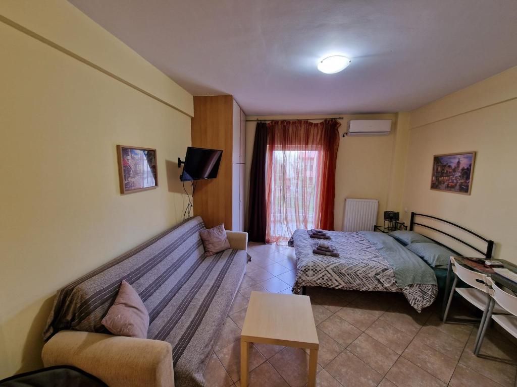 Ένα ή περισσότερα κρεβάτια σε δωμάτιο στο Diana's Cozy 3 Studio