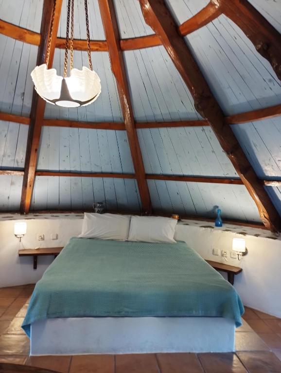 Postel nebo postele na pokoji v ubytování Windmill Studios