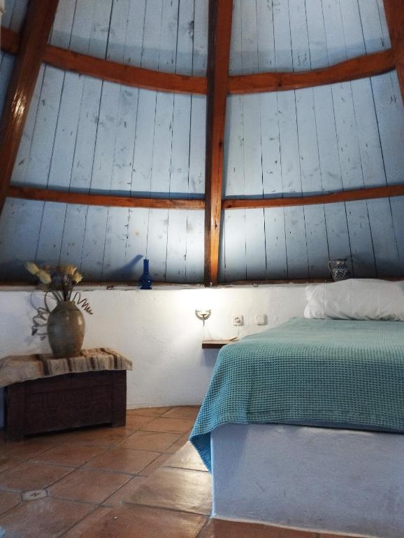 Postel nebo postele na pokoji v ubytování Windmill Studios