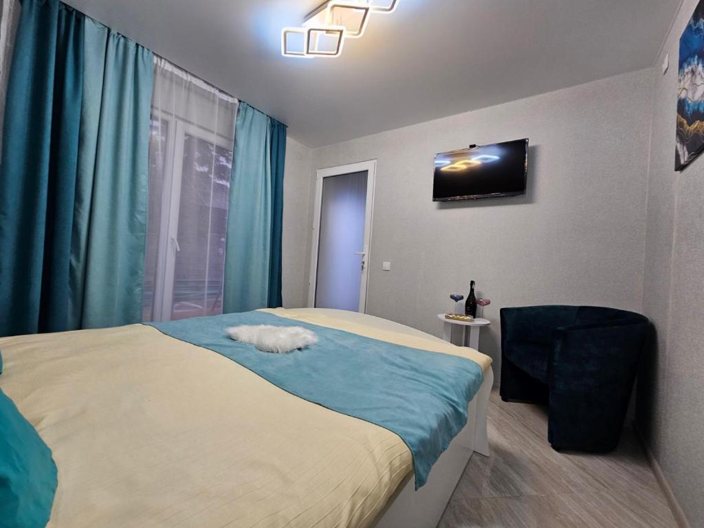 Postel nebo postele na pokoji v ubytování Villa Magnat