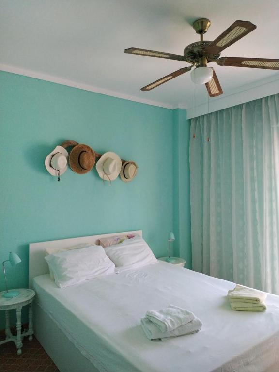 Ένα ή περισσότερα κρεβάτια σε δωμάτιο στο Athina's apartment