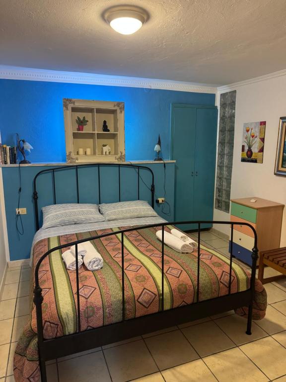 A bed or beds in a room at Il Vicolo Palinuro