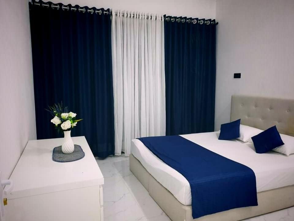 Postel nebo postele na pokoji v ubytování Villa Ayaavi Weligama