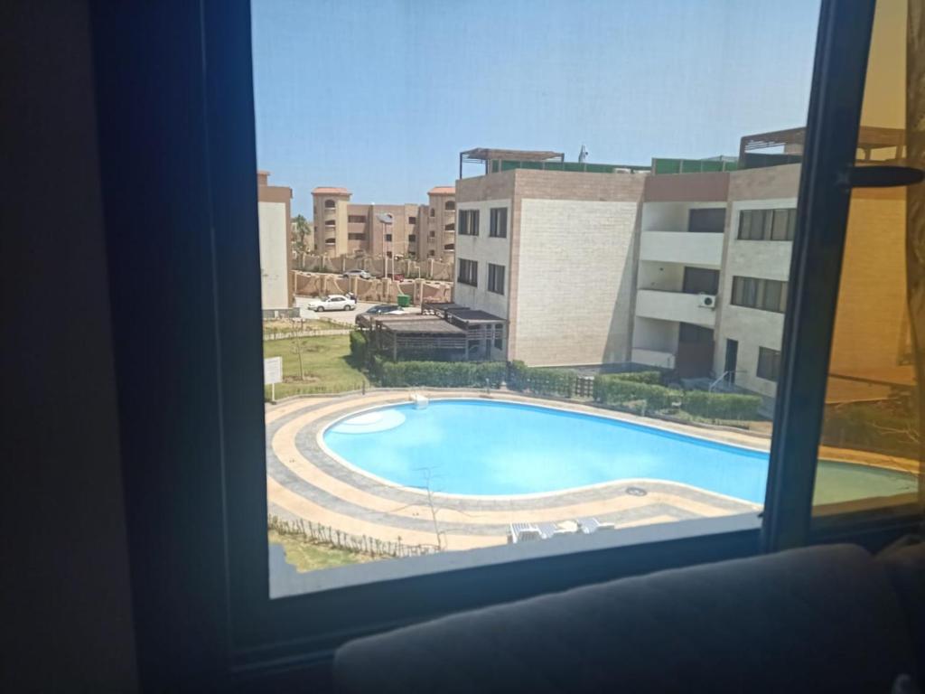 Bazén v ubytování شاليه فندقي هلنان بورفؤادHelnan Hotel Chalet in Port Fouad, Port Said nebo v jeho okolí
