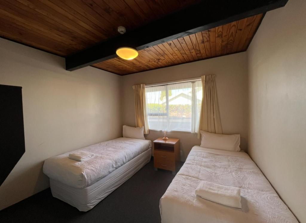 Postel nebo postele na pokoji v ubytování Mountain View Motel