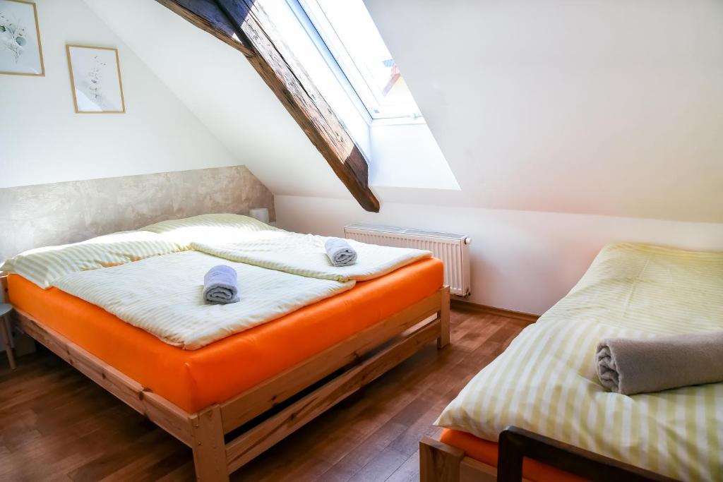 Postel nebo postele na pokoji v ubytování Ubytování Pod Světem-rodinný dům