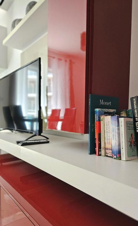 TV a/nebo společenská místnost v ubytování Calypso Apartment