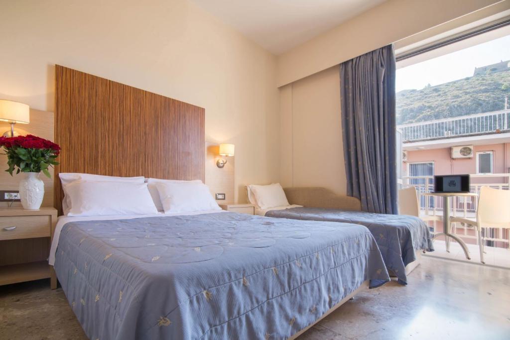 Cama o camas de una habitación en Hotel Elena