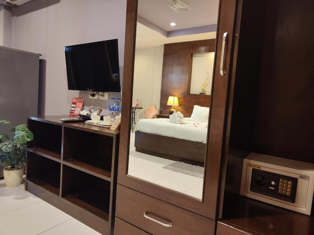 Postel nebo postele na pokoji v ubytování Purimas Resortel