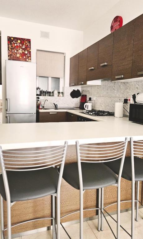 Kuchyň nebo kuchyňský kout v ubytování Calypso Apartment