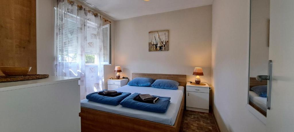 Posteľ alebo postele v izbe v ubytovaní Apartments Zara- ZD