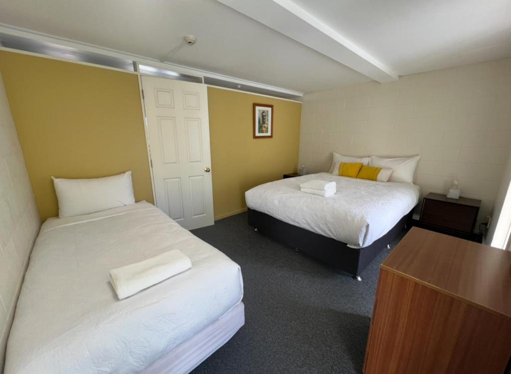 Postel nebo postele na pokoji v ubytování Mountain View Motel