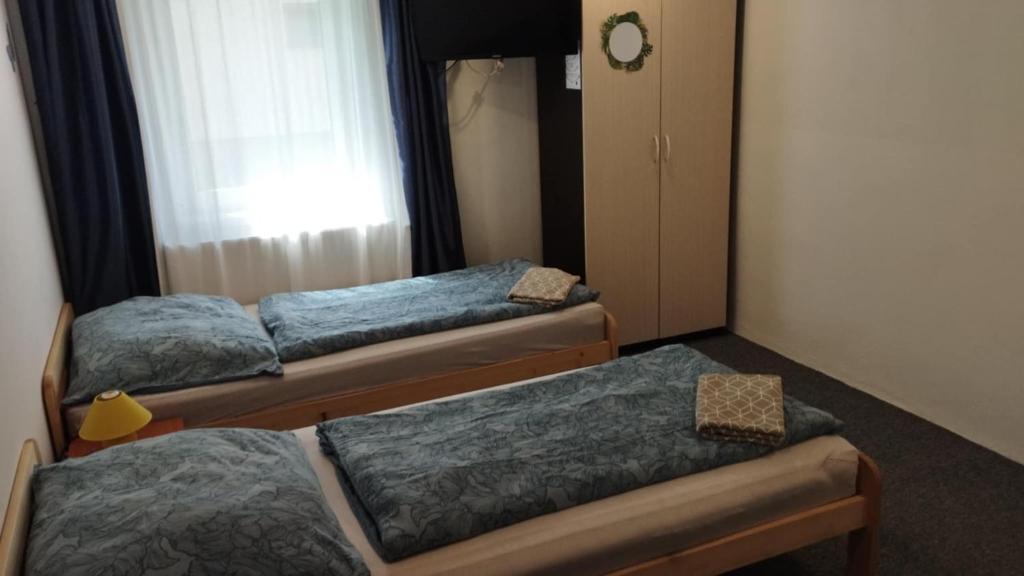 Postel nebo postele na pokoji v ubytování Villa LIKE "garden-grill"
