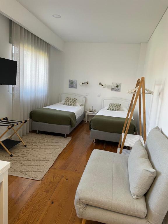 Postel nebo postele na pokoji v ubytování Botica Guesthouse