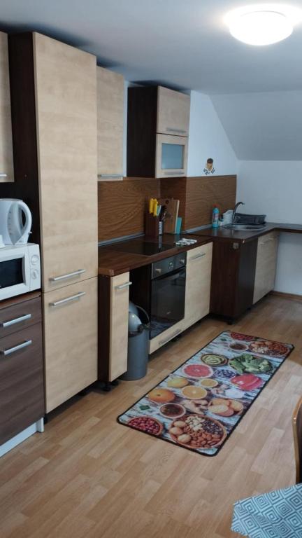 Kuchyň nebo kuchyňský kout v ubytování Villa LIKE "garden-grill"