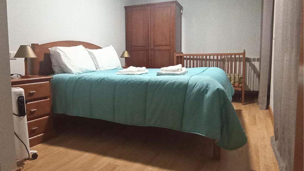 Postel nebo postele na pokoji v ubytování Casa da Lage - Piscina privada - Gerês