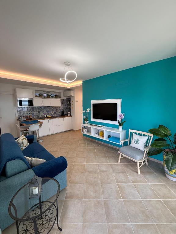TV a/nebo společenská místnost v ubytování Blu Vesuvius Sorrento