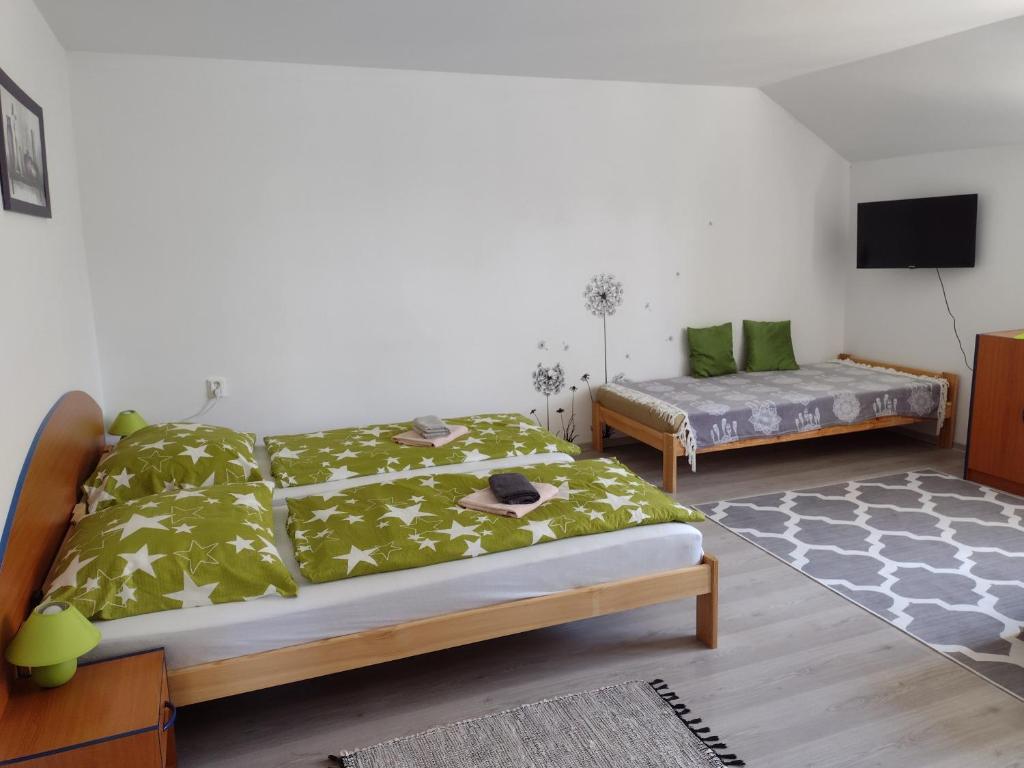 Postel nebo postele na pokoji v ubytování Villa LIKE "garden-grill"