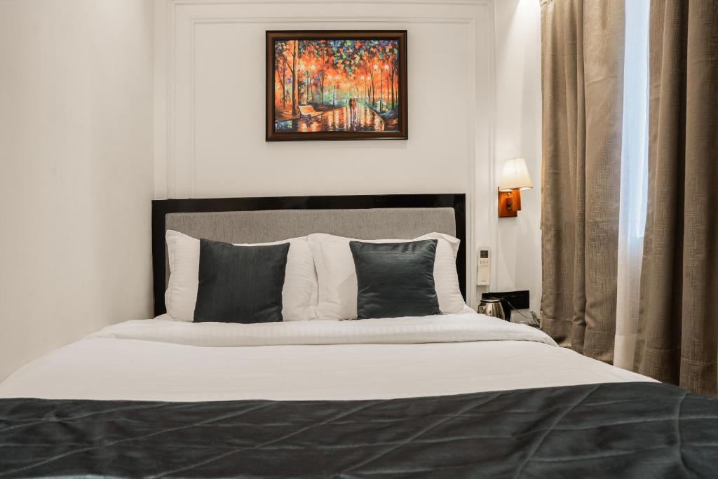 Postel nebo postele na pokoji v ubytování Hotel Ichamati