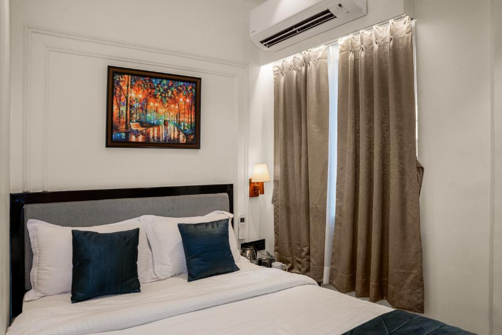 Postel nebo postele na pokoji v ubytování Hotel Ichamati
