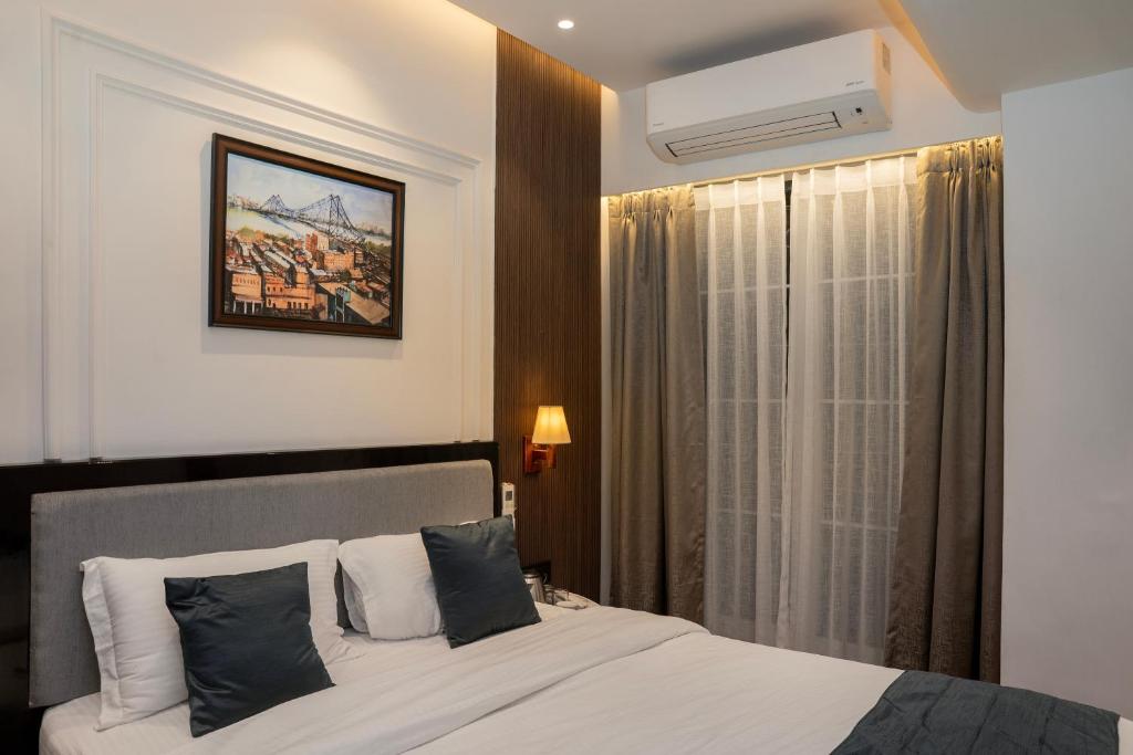 Postel nebo postele na pokoji v ubytování Hotel Ichamati