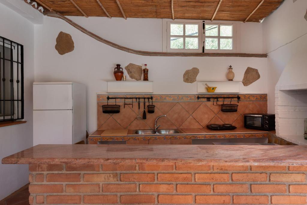 Kuchyňa alebo kuchynka v ubytovaní Villa Piscina & Jacuzzi Privado