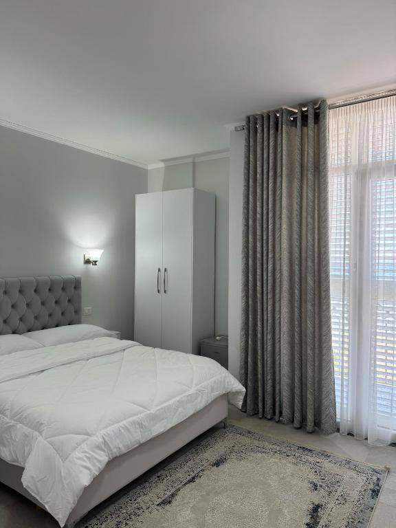 Postel nebo postele na pokoji v ubytování DIELL HOTEL