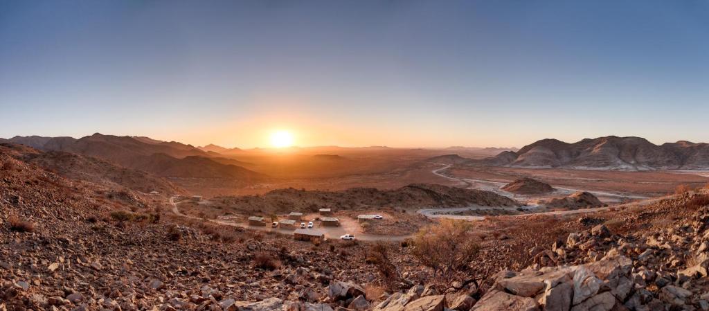 a view of the sunset from the top of a mountain at Spreetshoogte Campsite in Namibgrens