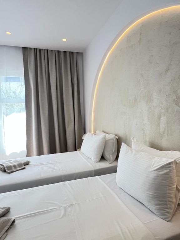 Letto o letti in una camera di Hotel Galini