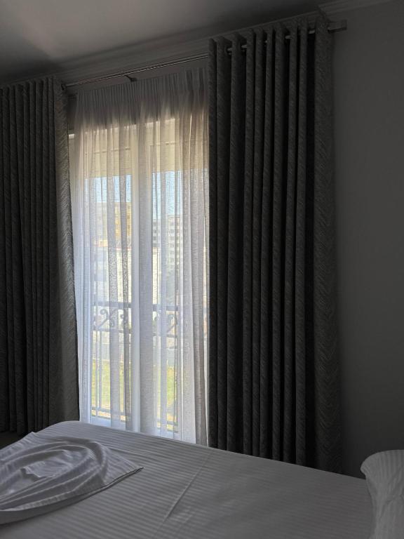 Postel nebo postele na pokoji v ubytování DIELL HOTEL