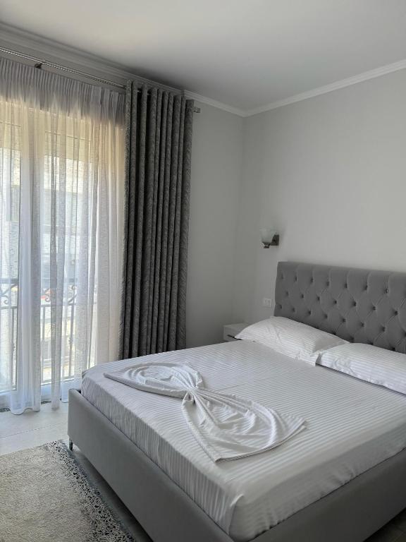 Postel nebo postele na pokoji v ubytování DIELL HOTEL
