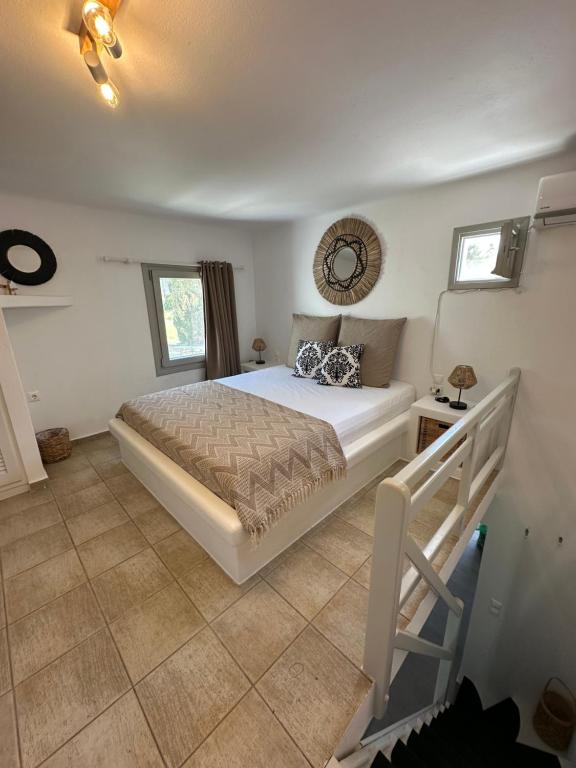Postel nebo postele na pokoji v ubytování Egea House
