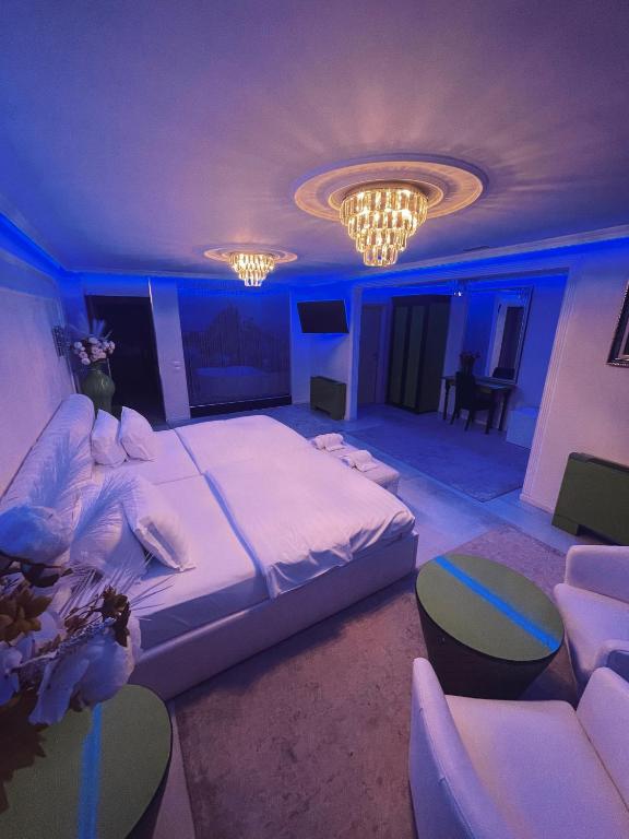 Llit o llits en una habitació de Hotel Rosa Blu
