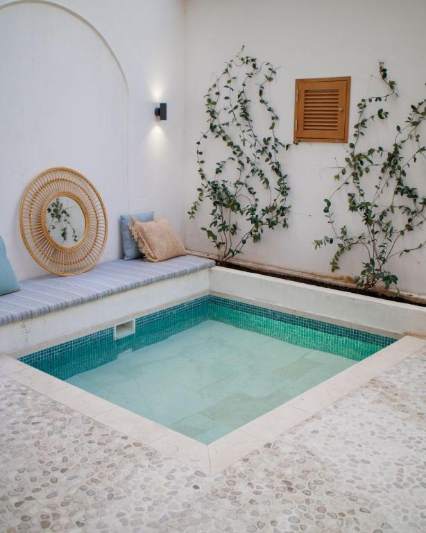 Bazén v ubytování Casa du Soleil Hostal Boutique nebo v jeho okolí