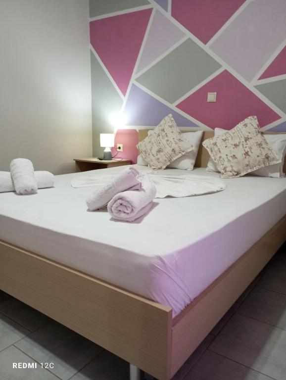 Postel nebo postele na pokoji v ubytování Sunray Apartments