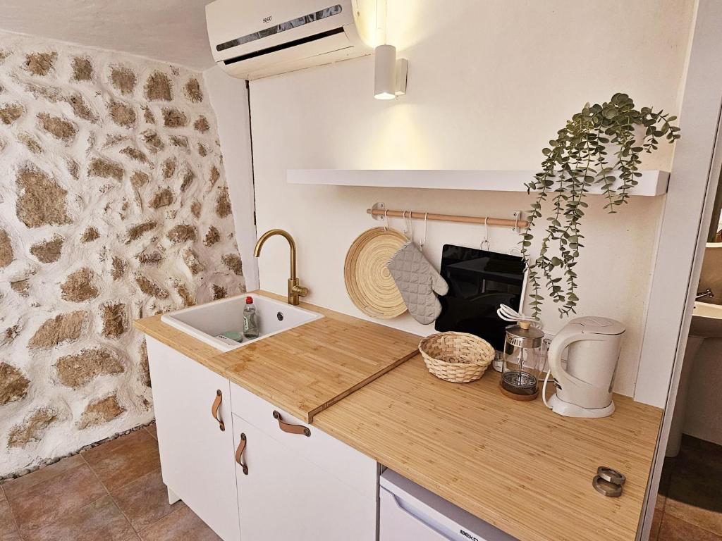 Kuchyň nebo kuchyňský kout v ubytování Agroturismo Finca Can Sec