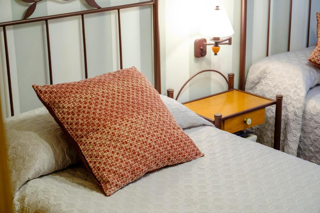 A bed or beds in a room at Apartamento Sella y Mar - VUT12AS