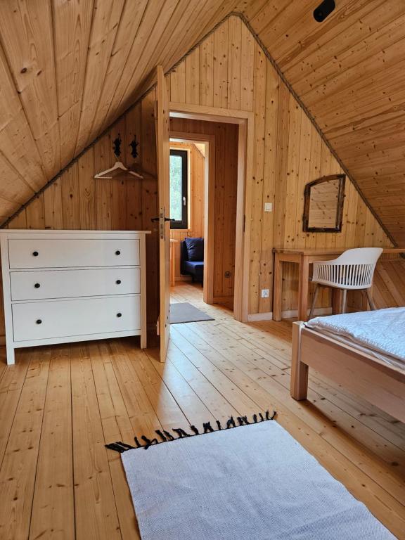 Postel nebo postele na pokoji v ubytování Domki nad Kukówkiem