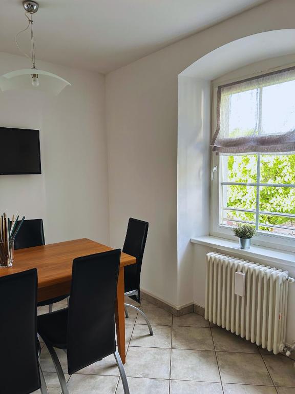 TV a/nebo společenská místnost v ubytování Casa nel centro di Cembra