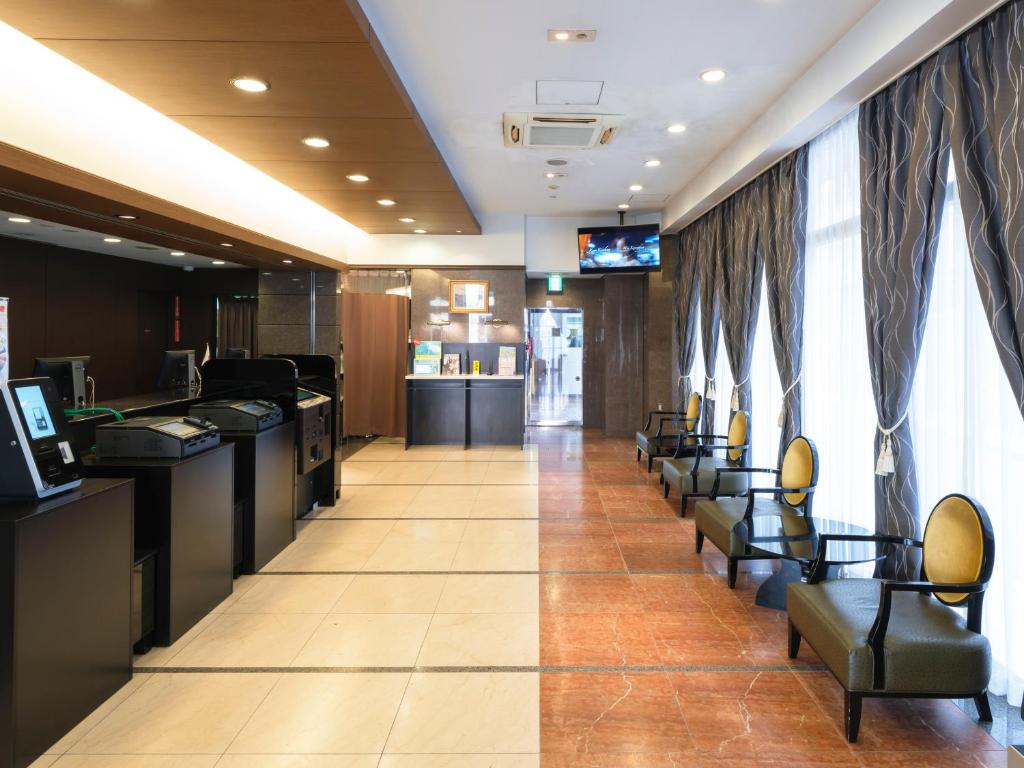 TV a/nebo společenská místnost v ubytování APA Hotel Yokohama Kannai