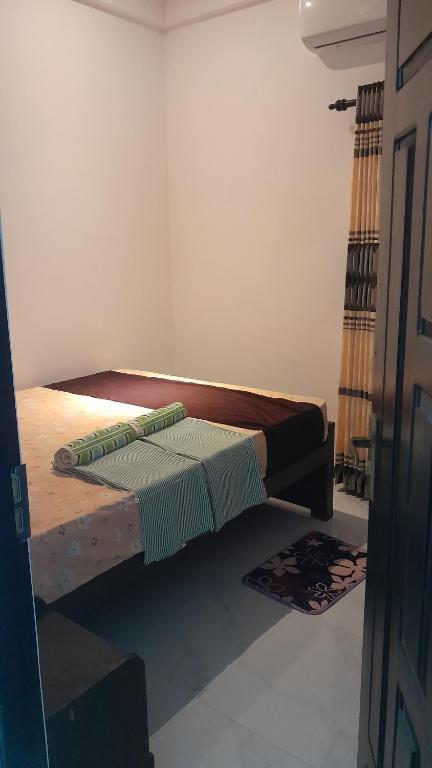 Postel nebo postele na pokoji v ubytování Theepan's Home